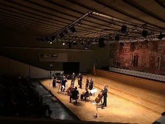 José playing a Trinity prototype with the orchestra 1